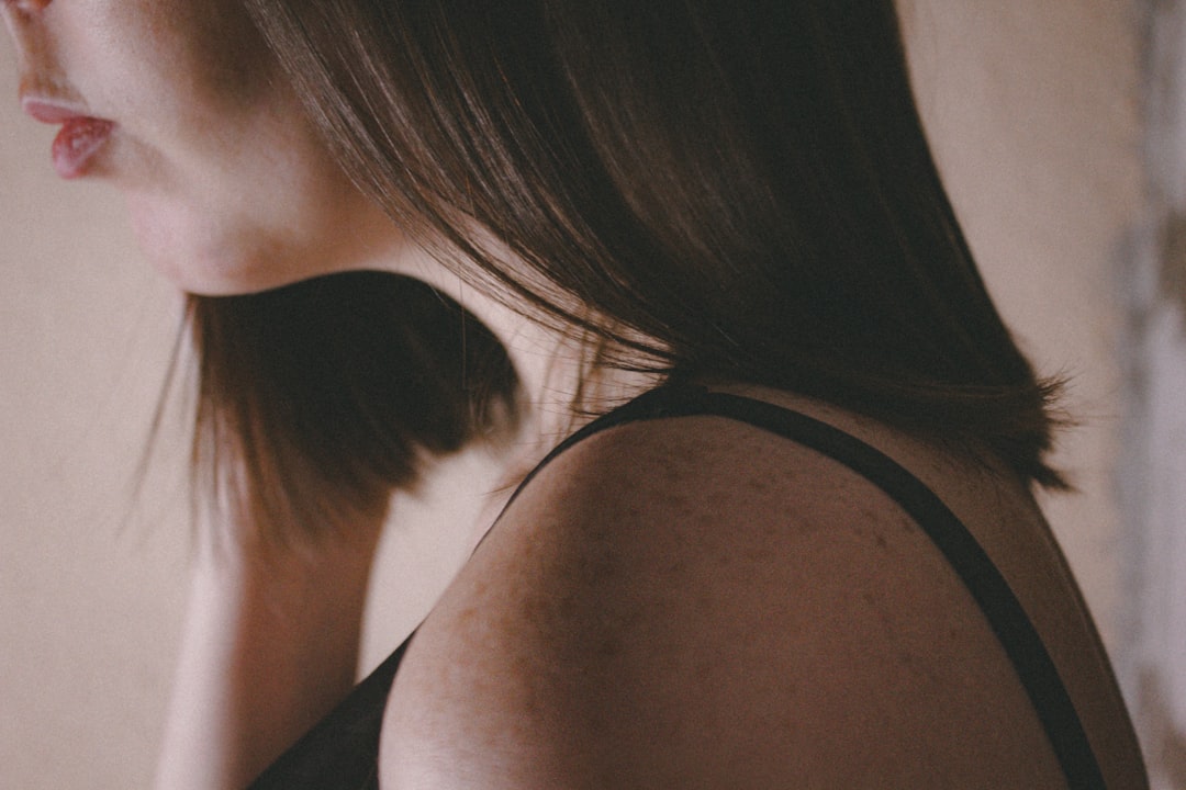 a close up of a person with a cell phone