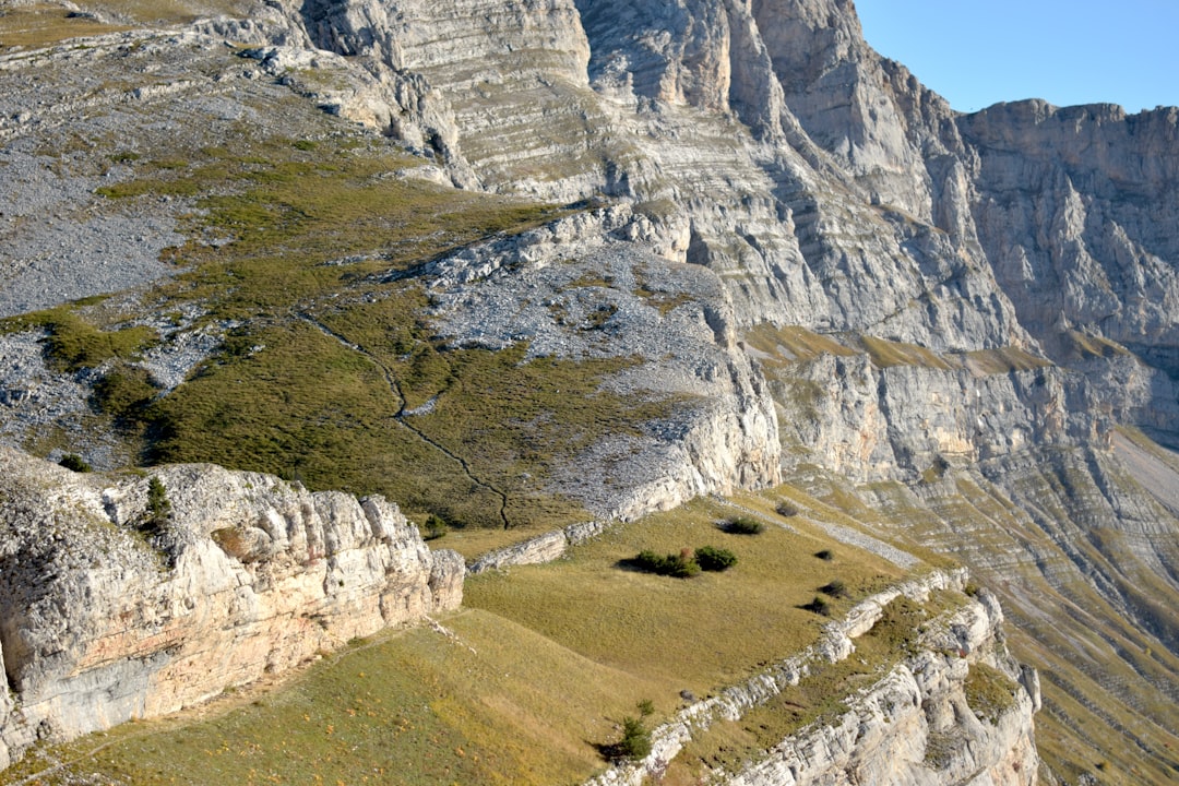 Steep rocky mountain slopes with sparse vegetation